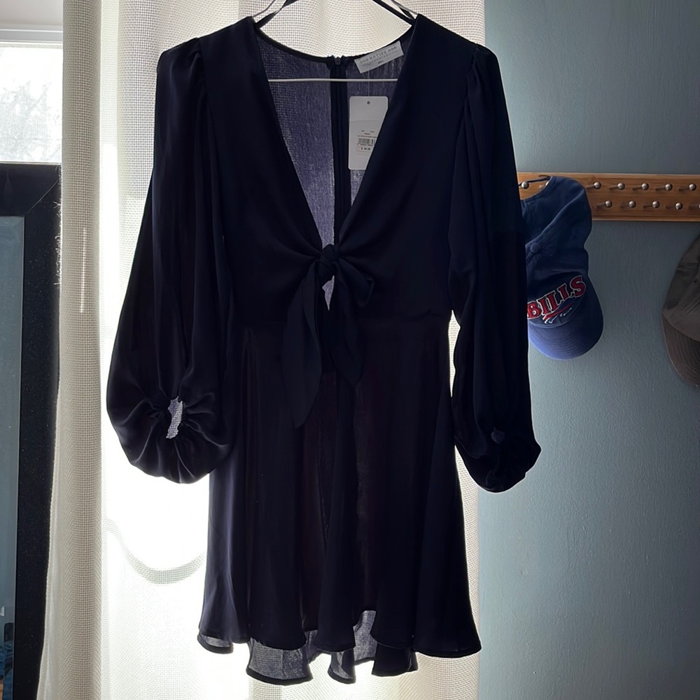 Navy blue long sleeve cut out mini dress size small from American threads. NWT.
